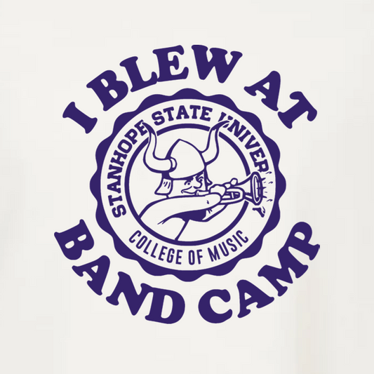 White t-shirt with purple 'I Blew at Band Camp' graphic and logo on a white background